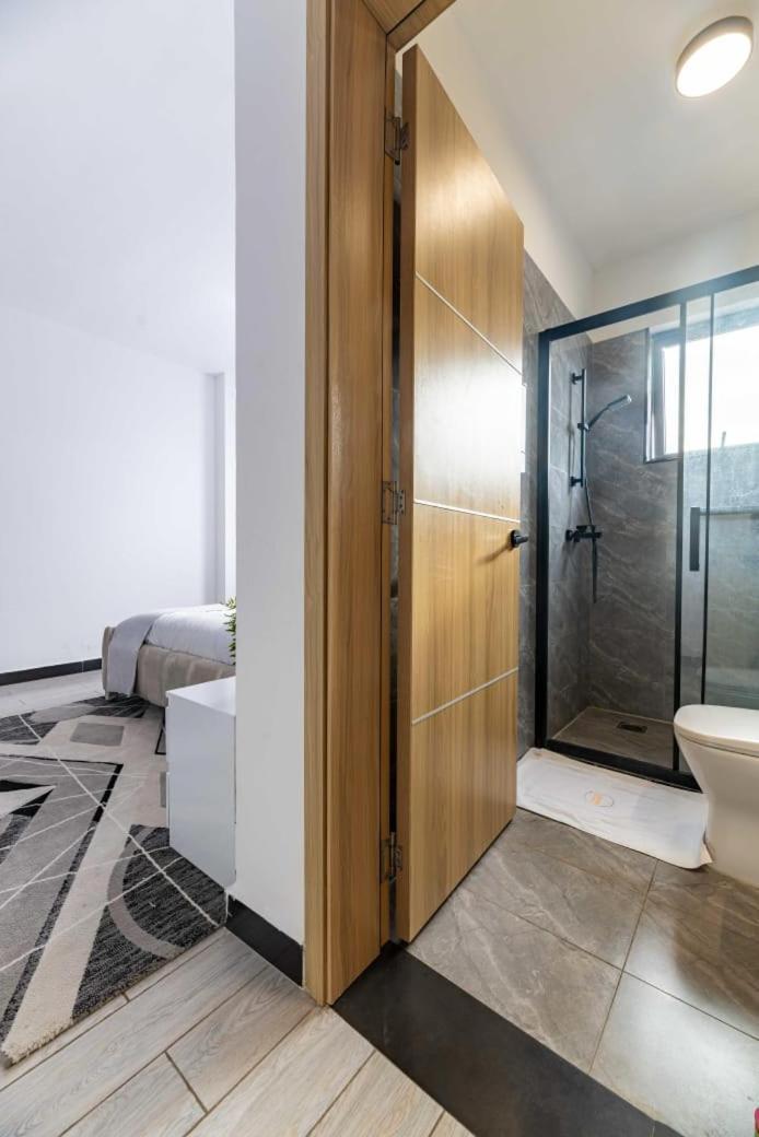 The Comfort Executive Loft Three Bedroom With Amazing Breathtaking Views ,heated Swimming Pool,gym And Rooftop Chilly Spot With Offers Breathtaking Views ,private Ample Parking Space With Designated Child Playground Area