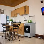 Acacia Apartment - Studio Heri Sherry Homes
