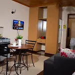 Acacia Apartment - Studio Heri Sherry Homes