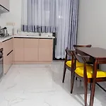 Greyscape Apple Tree Apartment