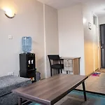Khaki Apartments