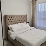 Executive Cozy Apartment With Fully Equipped Gym Heated Swimming Pool And Amazing Scenic City Views And Ample Parking And Children Playing Ground