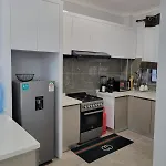 Executive Cozy Apartment With Fully Equipped Gym Heated Swimming Pool And Amazing Scenic City Views And Ample Parking And Children Playing Ground