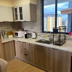 The Comfort Executive Loft Two Bedroomed Apartment With Amazin Breathtaking City Views ,Heated Swimming Pool,Gym And Rooftop Chill Spot With Offers Breathtaking City Views ,Private Ample Parking Space With Designated Child Playground Area
