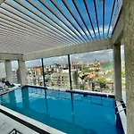Newly Furnished Two Bedroom Apartment With Swimming Pool, Fully Equipped Gym, Private Parking Space,Children Playground And Unbeatable Scenic City Views