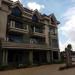 Magna Hotel And Suites