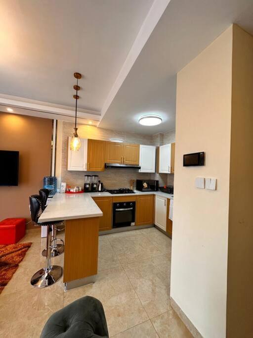 Enzi Heights - Cozy 1 Bedroom Near Eka Hotel, Pool, Gym, Lift Nairobi