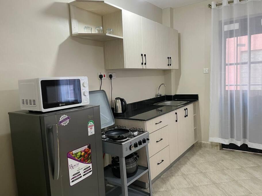 In Nairobi, Kitisuru “epic Brownstone” Apartment *