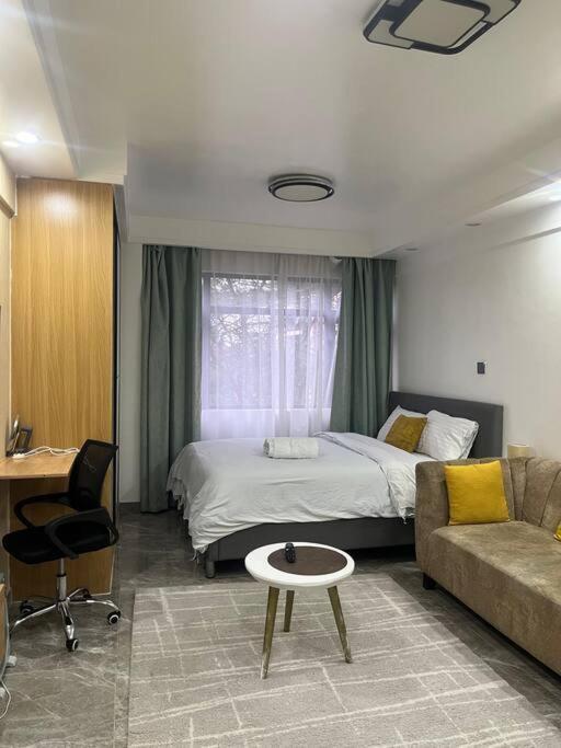 Cosy In Kilimani W Free Parking & Gym Apartment