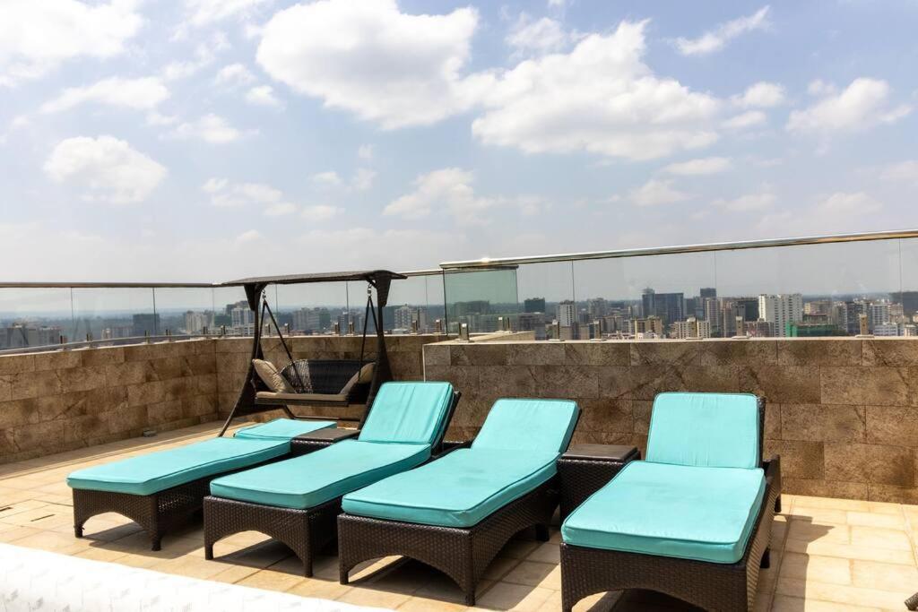 65-inch Tv, Westlands Apt, Rooftop Pool, Gym, Bbq