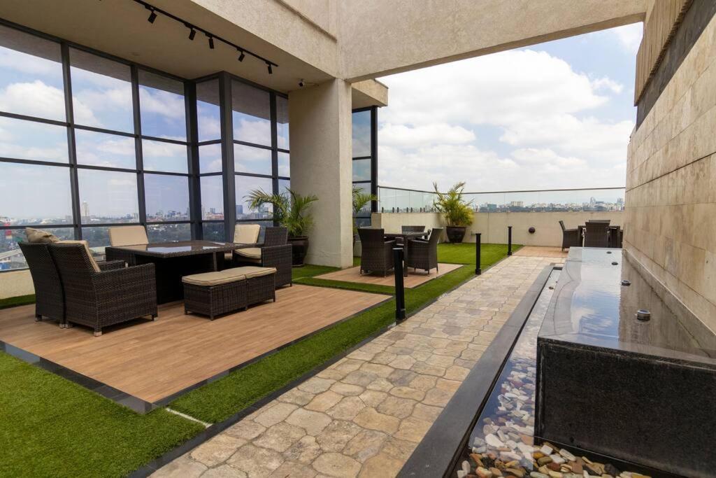 65-inch Tv, Westlands Apt, Rooftop Pool, Gym, Bbq * Nairobi