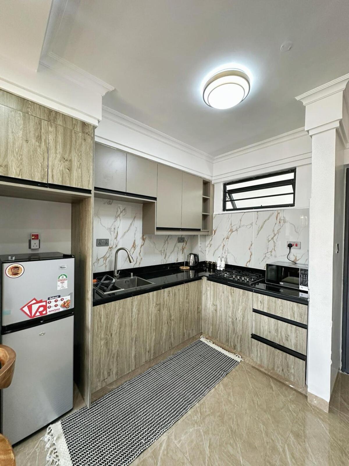 Apartment Serenity Stays, Modern 2-bedroom Near Yaya Centre