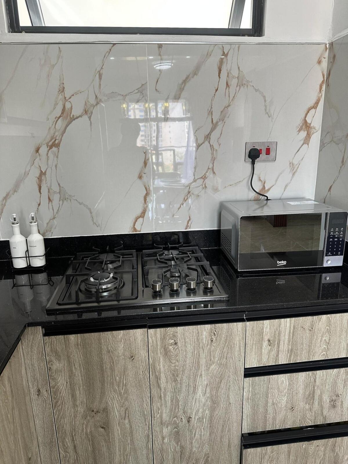 Serenity Stays, Modern 2-bedroom Near Yaya Centre * Nairobi