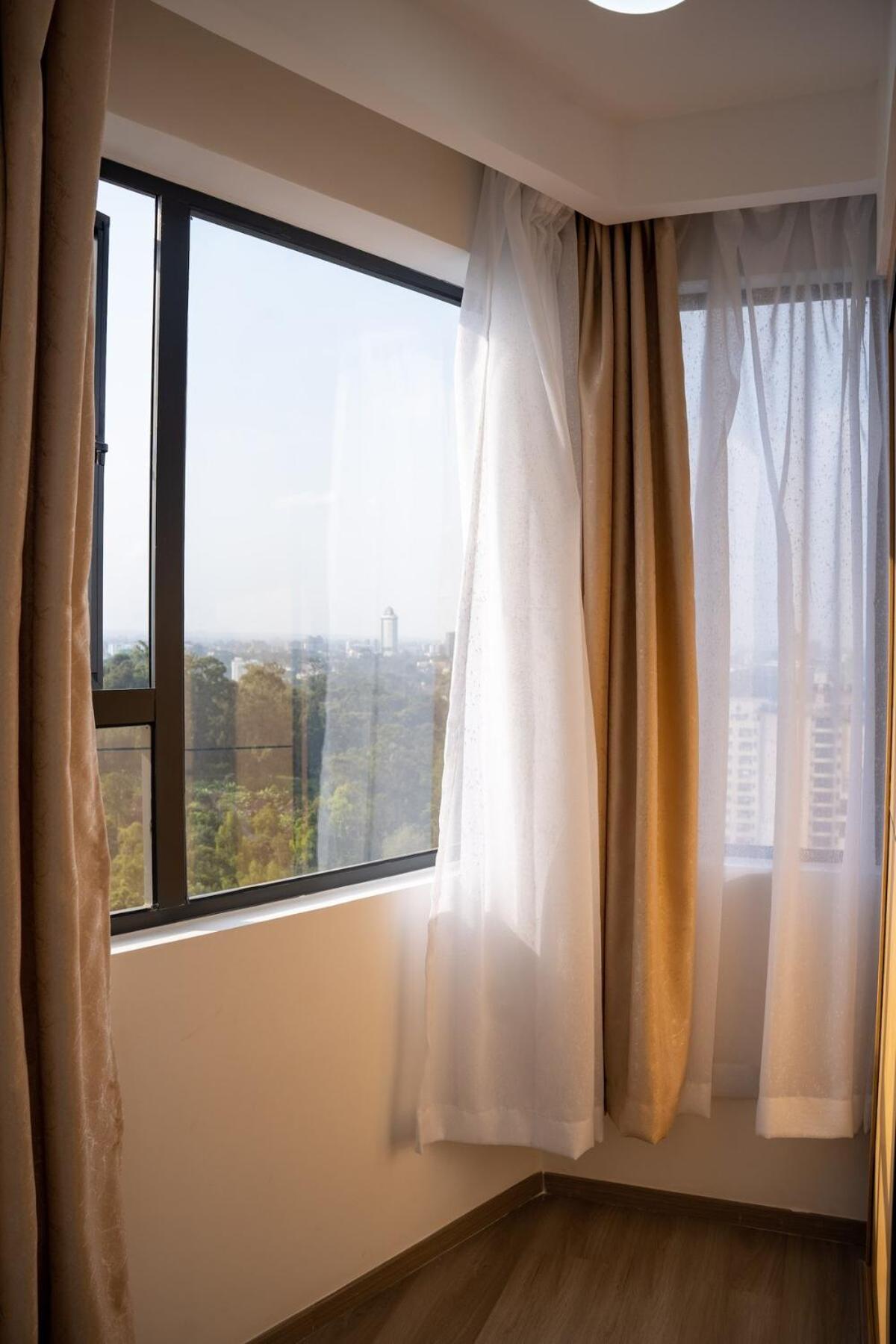 Apartment 1 Bedroom Stylish Haven With Skyline Views Nairobi