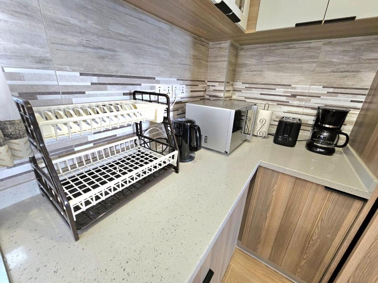 Apartment The Comfort Executive Loft With Amazin Breathtaking Views ,heated Swimming Pool,gym And Rooftop Chill Spot With Offers Breathtaking Views ,private Ample Parking Space With Designated Child Playground Area