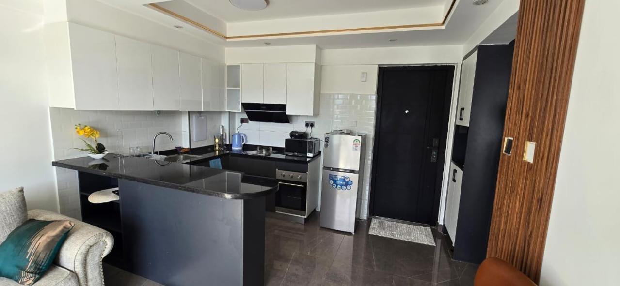 Oasis Kile- Modern 1-br, King Bed, Gym, Coffee Hse Nairobi
