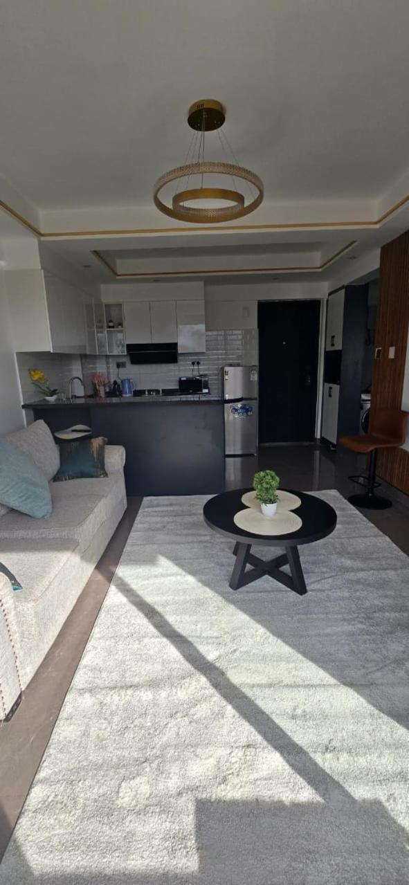 Oasis Kile- Modern 1-br, King Bed, Gym, Coffee Hse Apartment
