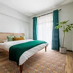 Lush Retreat Near Yaya Center With Pool, Gym & Views