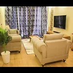 Modern Retreat Apartment With Heated Swimming Fully Equipped Gym Private Parking Space And A Relaxing Rooftop With Amazing City Views