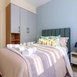 Serenity Suites Apartment With Private Parking Space ,Modern Equipped Gym, Swimming Pool And A Relaxing Rooftop With Unbeatable City Views