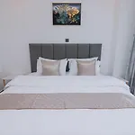 Modern Retreat Apartment With Swimming Fully Equipped Gym Private Parking Space And A Relaxing Rooftop With Amazing City Views