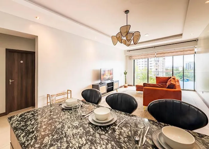 Lush Retreat Near Yaya Center With Pool, Gym & Views