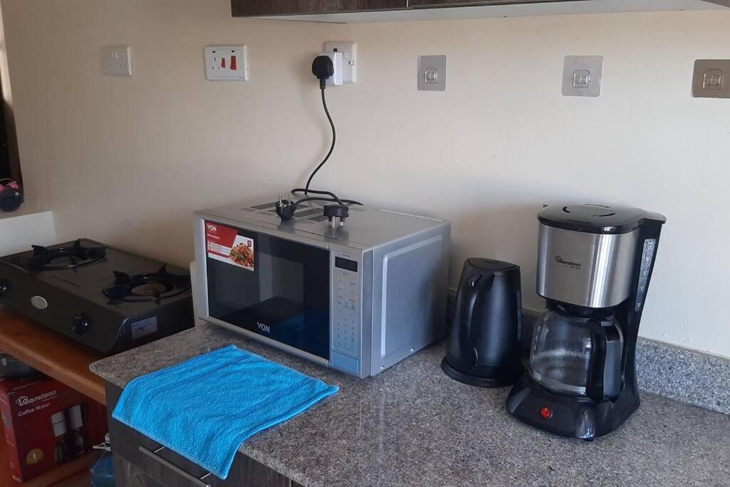 Cozy 1Br Retreat In Leafy Kitisuru, Near Un, Premier Shopping Malls & Jkia Expressway Nairobi