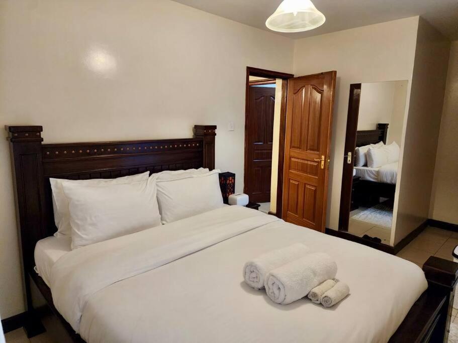 Apartment Serenity Retreat - 2 Bed With Pool & Gym Nairobi