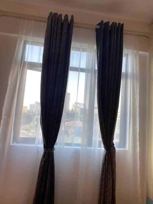 Apartment 2 Bedroom Ensuite Kilimani, A Cozy Luxury Living *