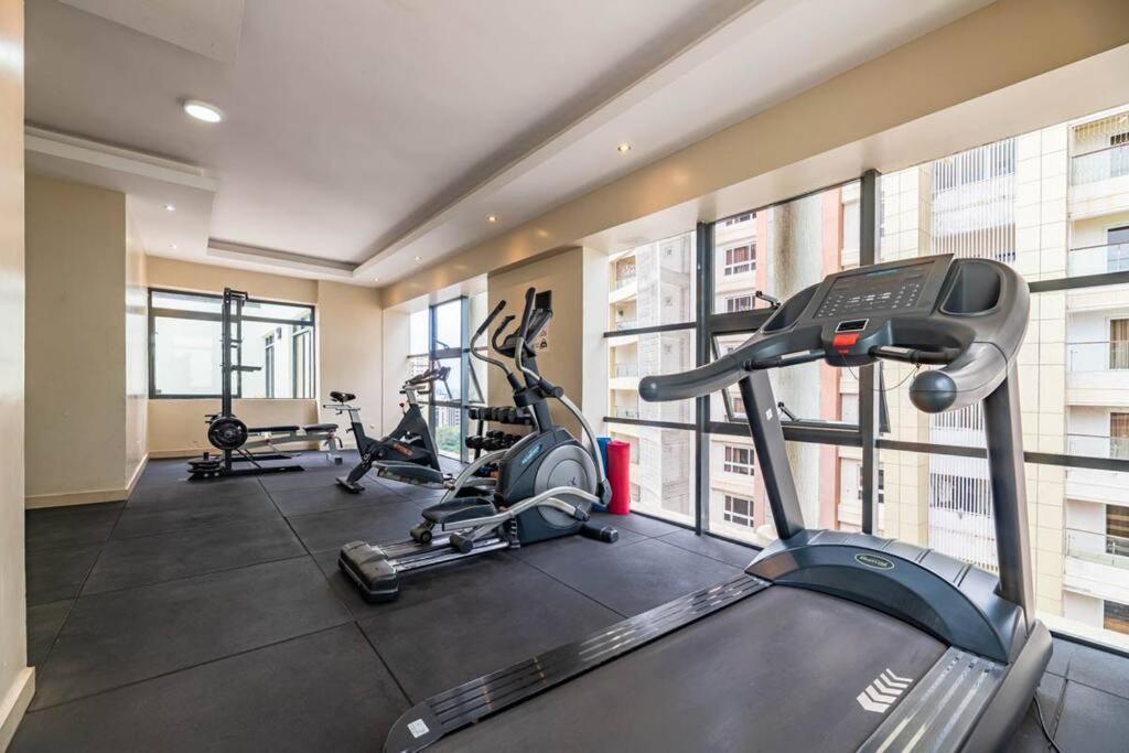Apartment Lush Retreat Near Yaya Center With Pool, Gym & Views *