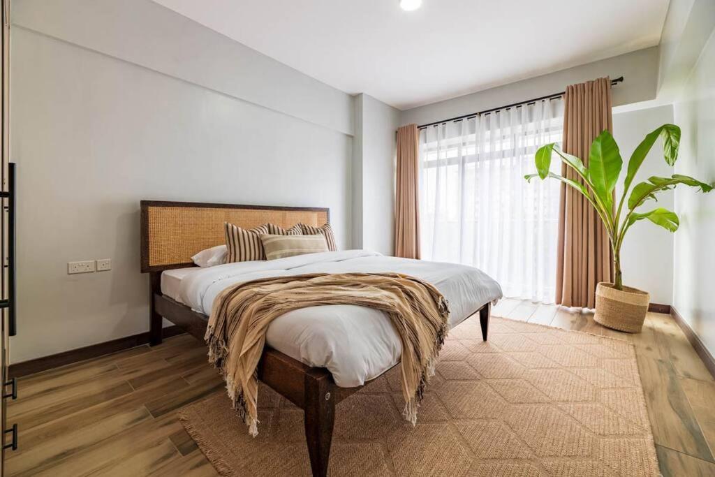 Apartment Lush Retreat Near Yaya Center With Pool, Gym & Views Nairobi